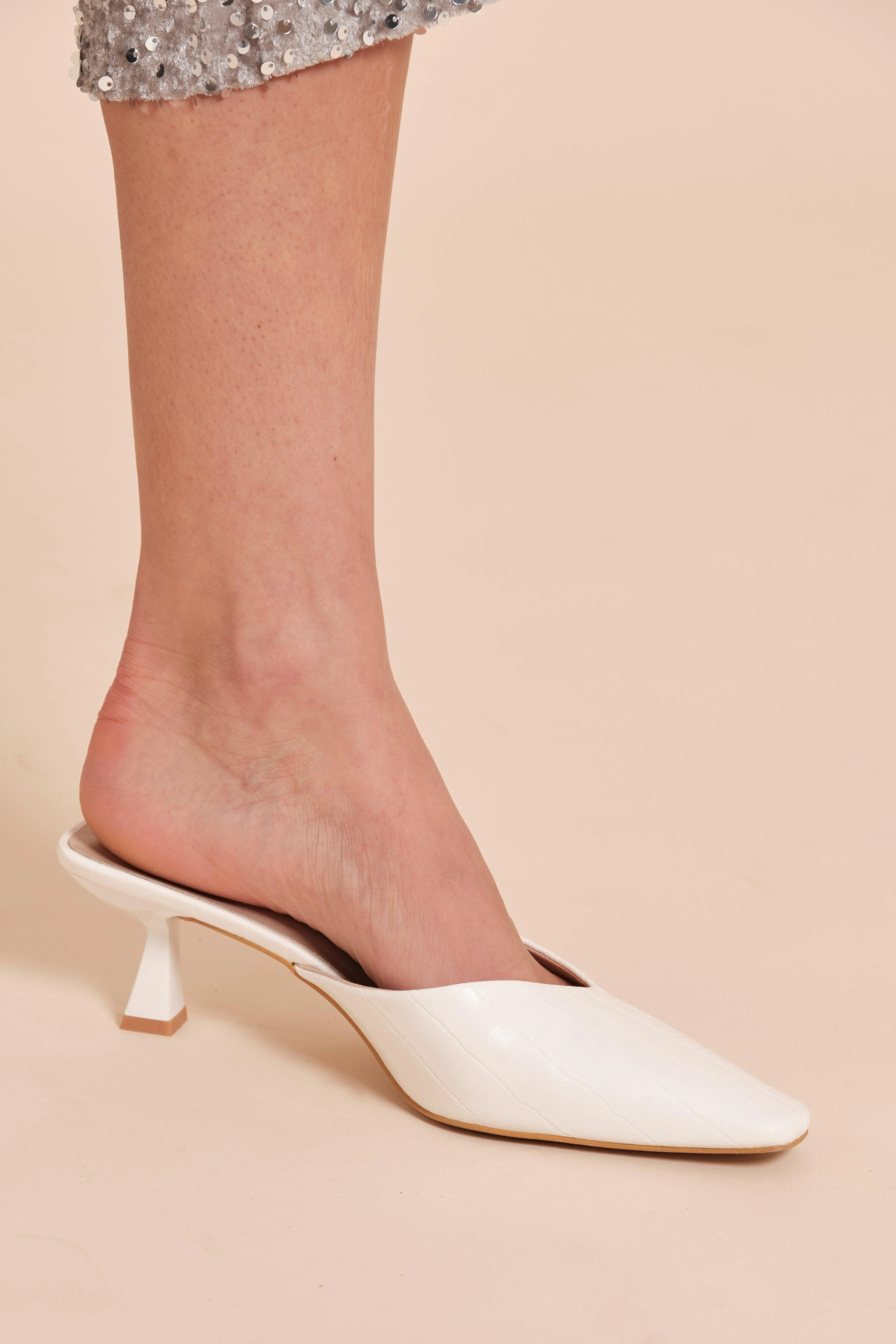 Mules couvertes sur petit talon